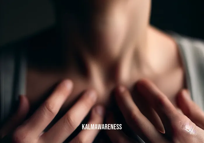mindfulness discussion questions _ Image: A close-up of a person taking a deep breath, their eyes closed, trying to calm their racing thoughts. Image description: Their hands are placed on their chest as they focus on their breath, attempting to find stillness.