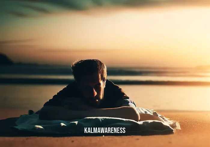 guided meditation lying down _ Image: A serene beach at sunset with a person lying down on a towel, stressed. Image description: On a serene beach at sunset, a person lies down on a beach towel, their face reflecting stress and tension.