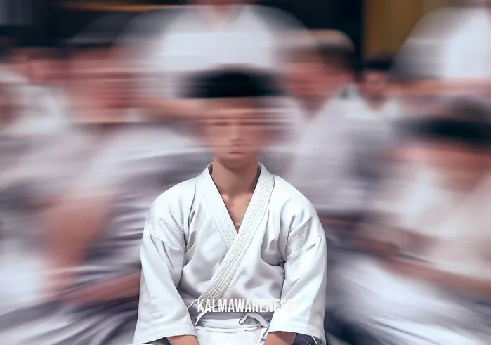 meditation in martial arts _ Image: A bustling martial arts dojo, filled with students practicing various techniques with intense expressions. In the center, a frustrated student sits with slumped shoulders, unable to concentrate.Image description: Amidst the energetic flurry of training, a young martial artist sits disheartened, surrounded by motion-blurred peers. His furrowed brows and distant gaze reveal his struggle to focus amid the chaos.