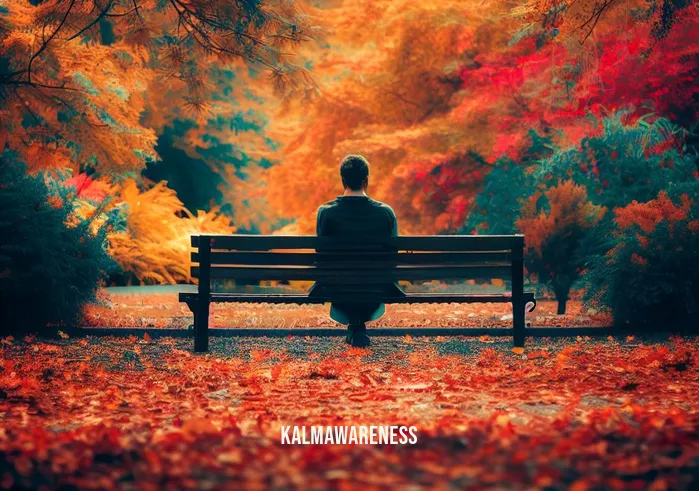 fall meditation _ Image: A lone person sitting cross-legged on a park bench, surrounded by colorful autumn leaves. Image description: Amidst the vibrant fall foliage, a solitary individual sits on a bench, finding a moment of stillness and contemplation.