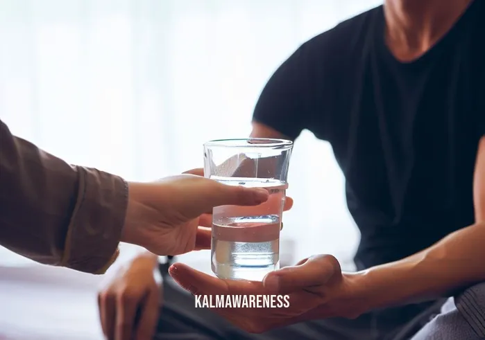 feeling sick after meditation _ Image: A concerned friend or family member offers a glass of water to the sick individual, showing empathy and support.Image description: A caring friend or family member reaches out with a glass of water to comfort the person who is feeling sick after meditation.