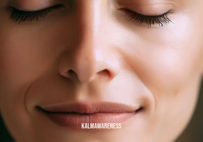10 minute positive meditation _ Image: Close-up of the woman, her face relaxed, and a faint smile appearing as she continues to meditate.Image description: A close-up of the woman