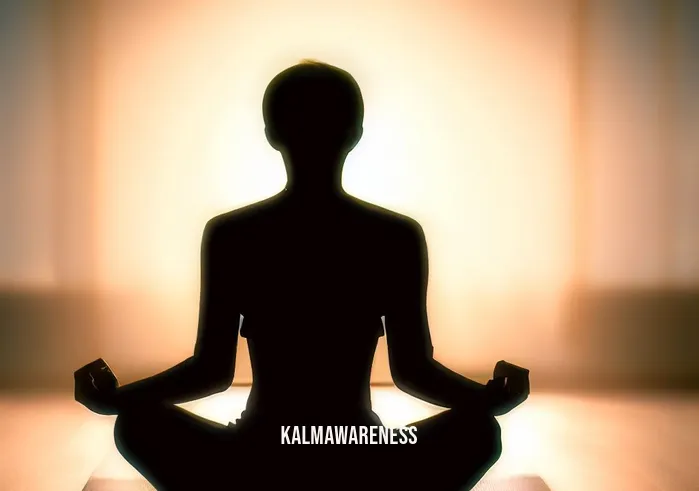 guided sleep meditation mindful movement _ Image: A silhouette of a person sitting cross-legged on a yoga mat, bathed in the gentle light of a sunrise, meditating peacefully.Image description: A silhouette in deep meditation, seated on a yoga mat. The dawn