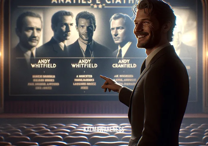 andy whitfield movie list _ Andy Whitfield, in a scene from one of his movies, is portrayed standing in front of a large movie screen that displays a list of his films. The setting is a dimly lit theater, and Andy is smiling, pointing towards the screen which highlights some of his well-known roles. The image conveys a sense of pride and nostalgia.