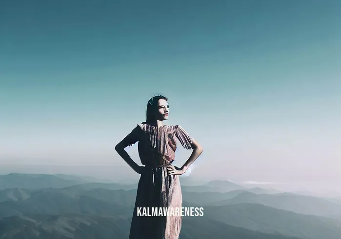confidence meditation _ Image: The woman, now radiating confidence, stands tall on a mountaintop, overlooking a vast, serene landscape, with a clear blue sky above.Image description: The woman exudes confidence as she stands atop a mountain, gazing at a tranquil landscape beneath a clear blue sky.